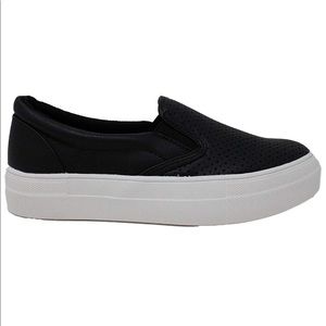 Soda Woman’s black slip on shoes